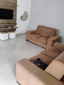 Ruang duduk di Casinha em mucuri