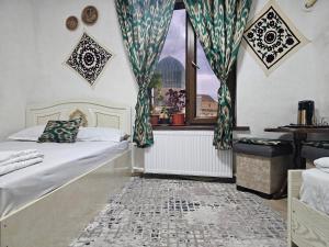 Postel nebo postele na pokoji v ubytování Mironshox Guest House + 28 fotografií