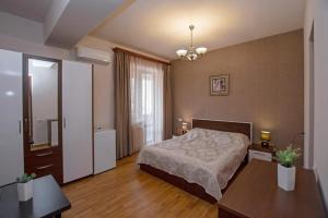 Postel nebo postele na pokoji v ubytování Seasons Boutique Hotel