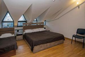 Postel nebo postele na pokoji v ubytování Seasons Boutique Hotel