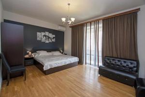 Postel nebo postele na pokoji v ubytování Seasons Boutique Hotel