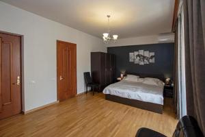 Postel nebo postele na pokoji v ubytování Seasons Boutique Hotel