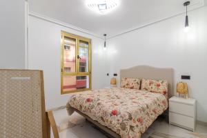 Postel nebo postele na pokoji v ubytování Dar Alisios 2