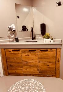 a bathroom counter with a sink and a mirror at Kalia Beach Hotel Side in Side +125 photos