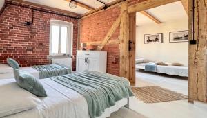 Postel nebo postele na pokoji v ubytování Apartamenty Marea Rentals Old Town Ustka