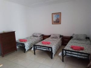 Postel nebo postele na pokoji v ubytování Salma's