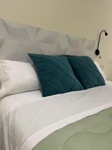 Posteľ alebo postele v izbe v ubytovaní HABITACION CENTRAL CON WIFI