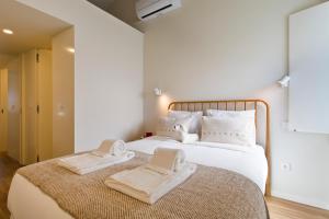 Postel nebo postele na pokoji v ubytování Gabi's House