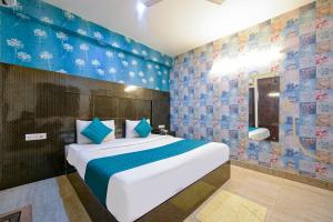 Postel nebo postele na pokoji v ubytování Hotel The White Sand Suites + 37 fotografií