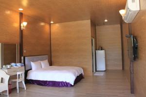 Llit o llits en una habitació de Kenting Dream House