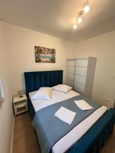 Posteľ alebo postele v izbe v ubytovaní Apartment A6 sea view