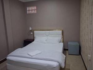 Postel nebo postele na pokoji v ubytování Twilight Inn