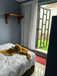 Katil atau katil-katil dalam bilik di Sherotha Homestay