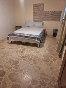 Ένα ή περισσότερα κρεβάτια σε δωμάτιο στο Carolina Hostel