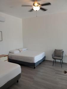 Postel nebo postele na pokoji v ubytování Casa BOSQUE LUCIERNAGAS