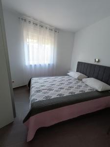 Postel nebo postele na pokoji v ubytování Apartment Kricin