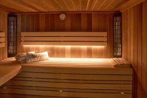 a sauna with a bed in a wooden room at Vila Vinita in Sveti Jurij ob Ščavnici