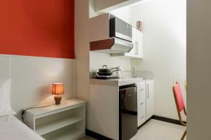 Kuchyň nebo kuchyňský kout v ubytování Emporis Resort