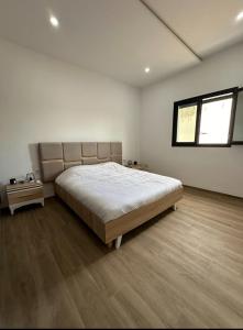 Ένα ή περισσότερα κρεβάτια σε δωμάτιο στο Villa PERLE DU SOLEIL