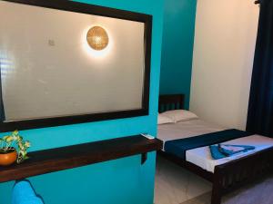Letto o letti in una camera di 360 Lotus Hostel Tangalle and Cowork