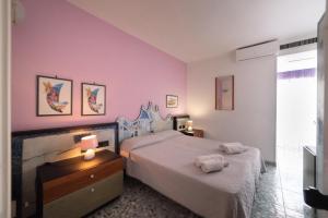 Postel nebo postele na pokoji v ubytování Hotel Pietra Verde