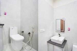 Vannituba majutusasutuses Super Townhouse Govardhan