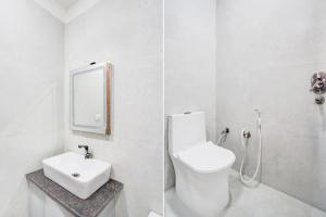 Koupelna v ubytování Super Townhouse Govardhan