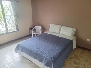 Ένα ή περισσότερα κρεβάτια σε δωμάτιο στο Carolina Hostel