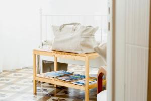 a bag sitting on a table in a room at "Lo Studiolo" in Nardò +36 photos