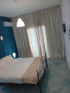 A bed or beds in a room at spyridoula studio