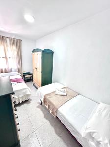 Postel nebo postele na pokoji v ubytování Apartamentos Empul El Mirador de Conil