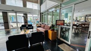 Posezení v ubytování HOTEL PERDIZES - FLAT Executivo - 1206