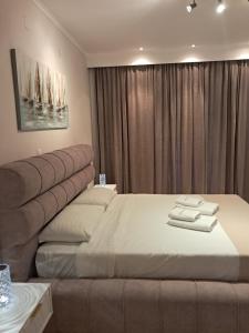 A bed or beds in a room at spyridoula studio