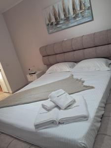 A bed or beds in a room at spyridoula studio