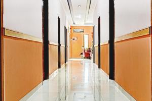 a corridor of an office building with a hallway at OYO 90268 Aliyah Syariah in Jakarta