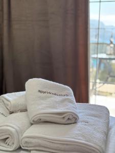 A bed or beds in a room at spyridoula studio