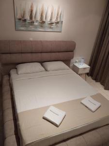A bed or beds in a room at spyridoula studio