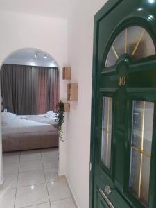 A bed or beds in a room at spyridoula studio