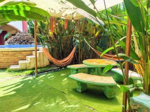 حديقة خارج Cool Vibes Beach Hostel