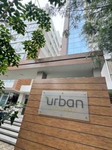 a sign for a lift bar in front of a building at Departamento Premium amplio y moderno - zona Cine Center in Cochabamba +2 photos
