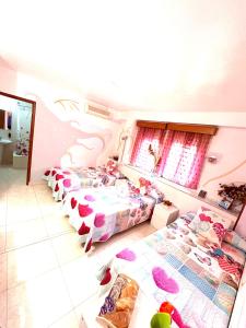 Posteľ alebo postele v izbe v ubytovaní Hostal La Rosa