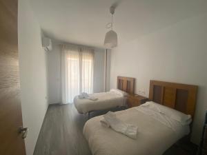 Postel nebo postele na pokoji v ubytování La Azucarera