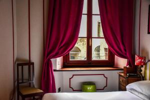 Postel nebo postele na pokoji v ubytování Hotel Hermitage