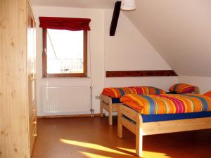 Postel nebo postele na pokoji v ubytování Ferienwohnung Am Jakobsweg