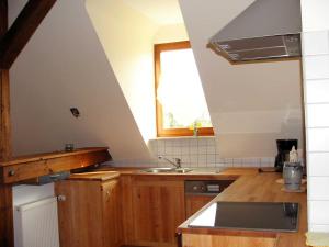 Kuchyň nebo kuchyňský kout v ubytování Ferienwohnung Am Jakobsweg + 3 fotografie