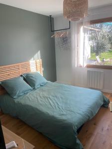 Posteľ alebo postele v izbe v ubytovaní Chambre bord de mer