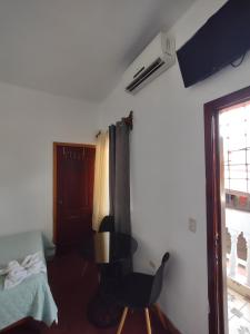 Een TV en/of entertainmentcenter bij Hotel Casa de Copan
