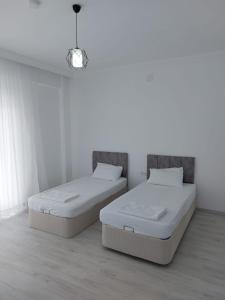 Postel nebo postele na pokoji v ubytování Villa Okaliptus 48