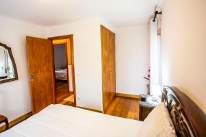 Postel nebo postele na pokoji v ubytování Casa Da Aldeia