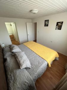Postel nebo postele na pokoji v ubytování Cabañas Campestres El Sauce